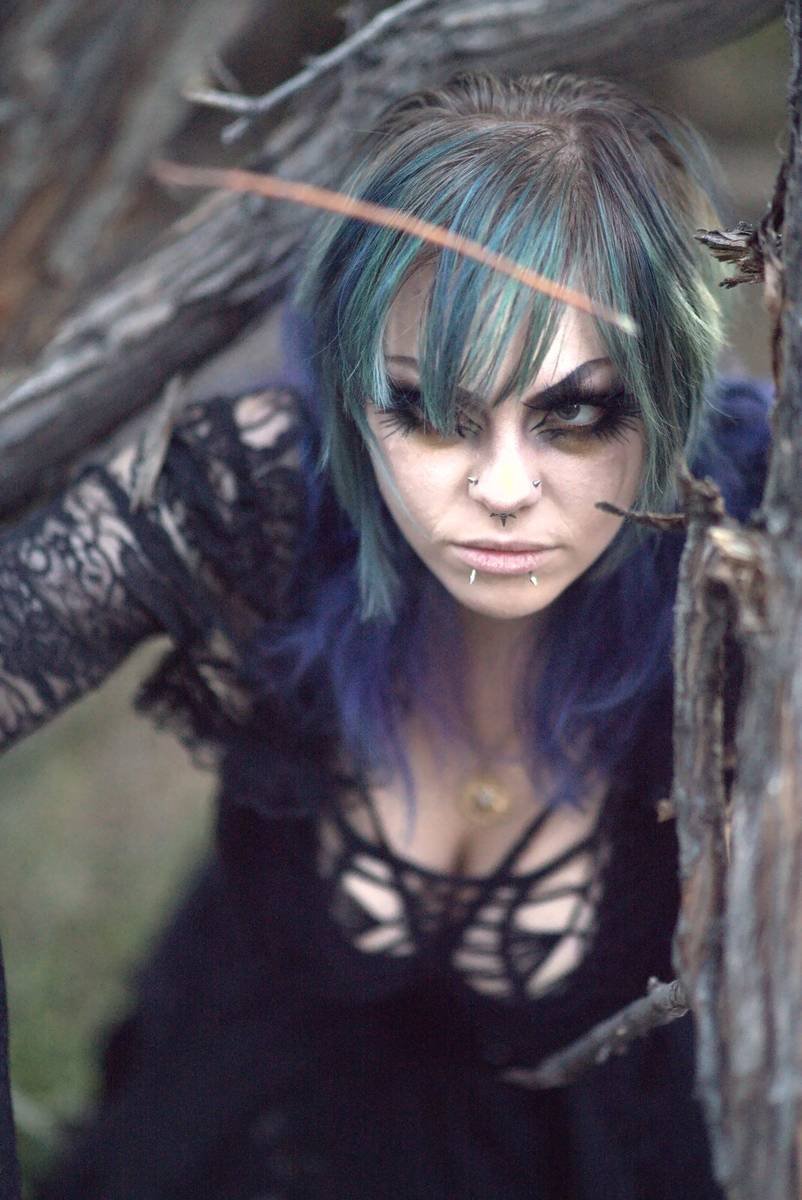 Close portrait through branches