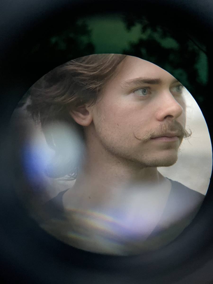 Portrait framed through a camera lens
