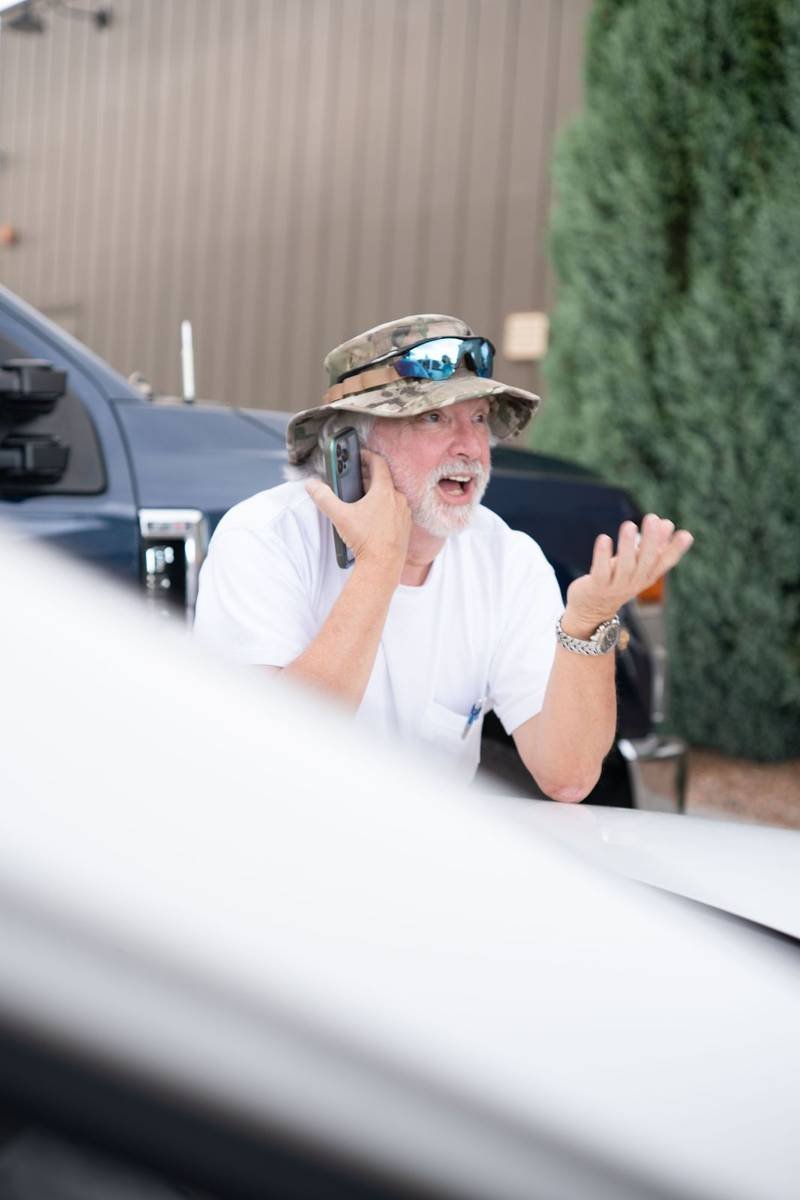 Producer on a phone call on set