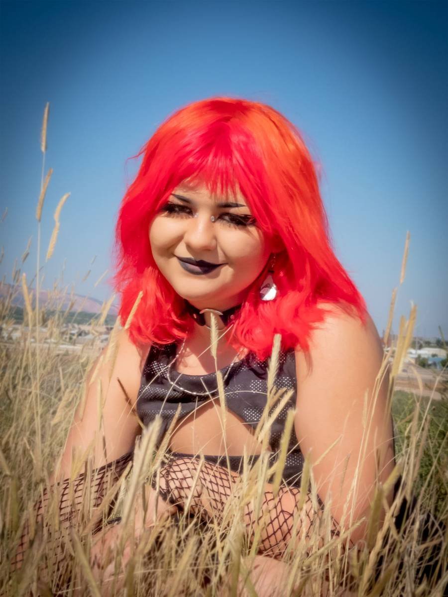 Senior portrait in tall grass